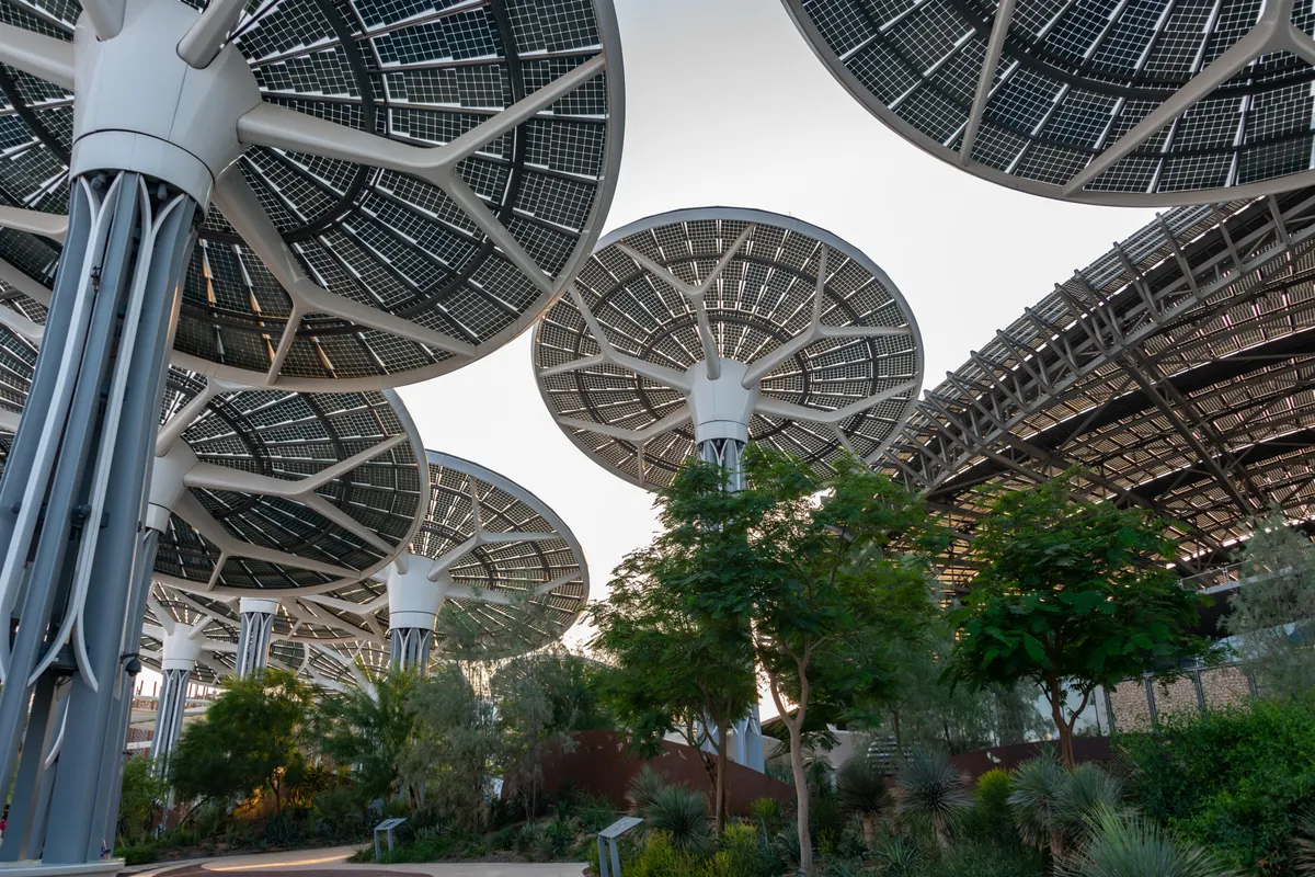 Futuristic solar canopy structures integrated into modern sustainable architecture