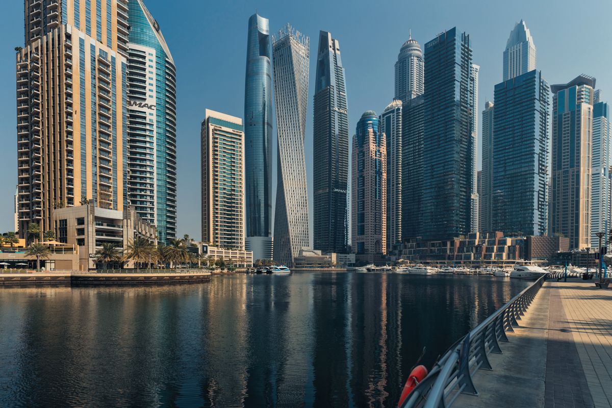 Modern skyscrapers and architectural landmarks in Dubai Marina representing the city's complex urban developments.